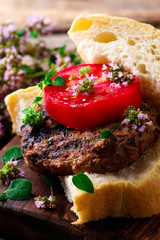 Grilled herbed burger.style rustic .selective focus
