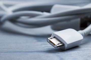 Closeup of micro usb smart phone power cable. - obrazy, fototapety, plakaty