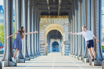 Couple on Bir-Hakeim bridge in Paris, France