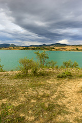 Fototapeta na wymiar The Alloz reservoir in Lerate, Navarra, Spain
