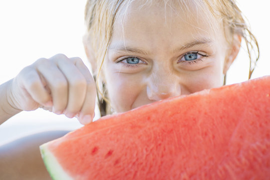 Girl eating water-melon