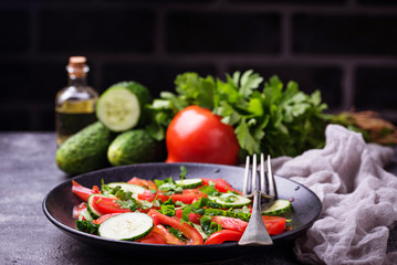 Vegetable salad with cucumber and tomato