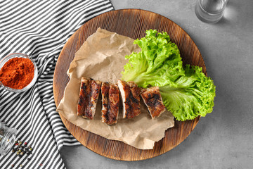 Yummy grilled sliced spare ribs on wooden plate