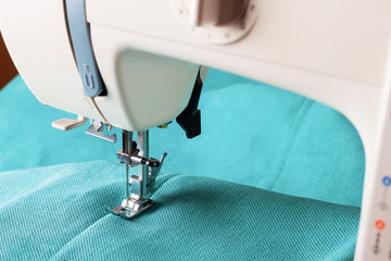 sewing machine and turquoise fabric