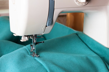 sewing machine and turquoise fabric