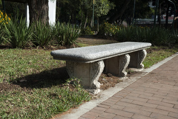 Old bench in urban park Guatemala