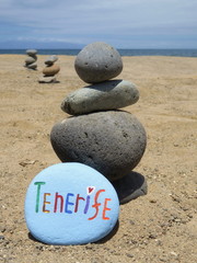 Souvenir from Tenerife on a carved and painted stone