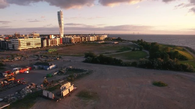 Aerial view of Malmo city buildings at sunset. Industrial, construction area