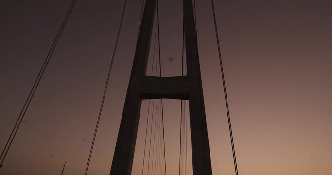 Low angle POV, driving on Yi Sun-Sin bridge at sunset