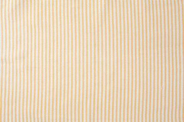 background of yellow cloth table.
