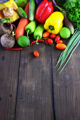 Fototapeta na wymiar Fresh vegetables on wooden table.