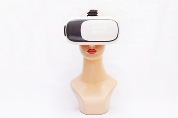 Female Mannequin Head Wearing Virtual Reality Headset Or 3D Glasses Over White Background