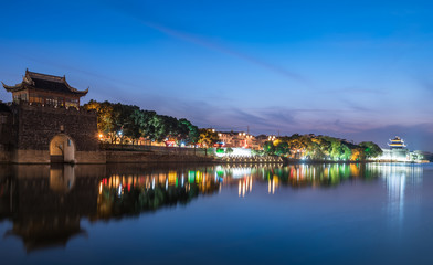 Fototapeta na wymiar Illuminated City At Waterfront in city of China.