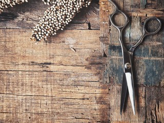 Hair cutting shears with dried flowers
