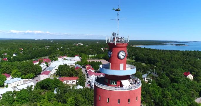 HANKO, UUSIMAA, FINLAND, JULY 7 Cinema 4k aerial sideway view of people on Hanko water tower, on Hango regatta day, in Uusimaa, Finland