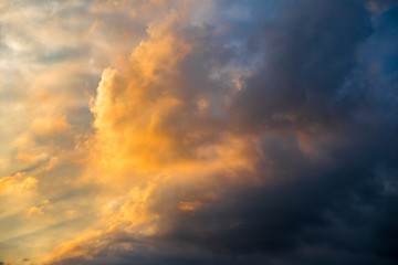 Fototapeta na wymiar Colorful dramatic sky with dark clouds