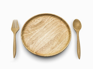 wooden spoon and wooden fork beside the wooden dish on white isolate.