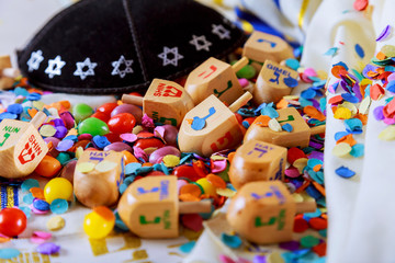 Fototapeta na wymiar Jewish holiday Dreidel still life composed of elements the Chanukah Hanukkah festival.