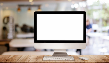 Work place concept : Mock up Blank screen computer desktop with keyboard in cafe or co-working background. - obrazy, fototapety, plakaty