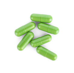 Purple pill capsule isolated on white background