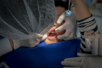 A boy teeth whitening and fluoride treatment