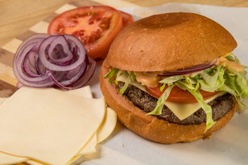 hamburguer artisan in table wood background