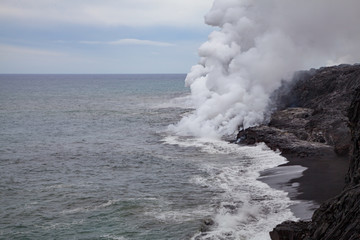 Fototapeta na wymiar Kilauea's Lava Meets the Ocean
