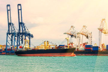Fototapeta premium container ship in import export and business logistic.By crane ,Trade Port , Shipping,cargo to harbor.Aerial view.Water transport.International.Shell Marine.Top view.