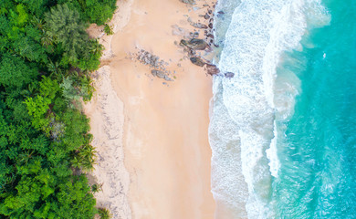 Sea aerial view,Top view,amazing nature background.The color of the water and beautifully bright.Azure beach with rocky mountains and clear water of Thailand ocean at sunny day.