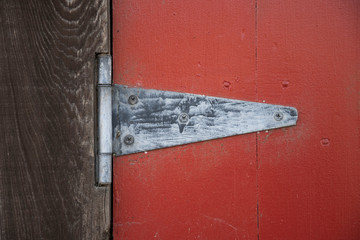 red door with hinge