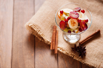 Fruit salad and spices on a canvas textile