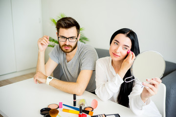 Bored husband waiting for wife