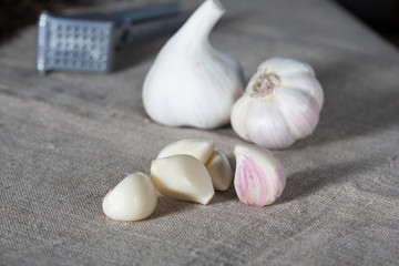 Garlic. Garlic bulbs with cloves on burlap background, concept healthy lifestyle.