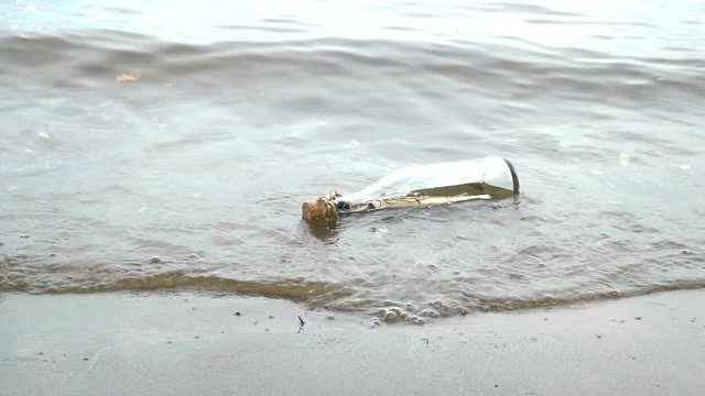 Message in a bottle on the seashore