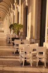 Fototapeta na wymiar Outdoor street cafe tables in Lisbon