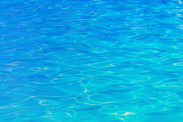 Abstract water background with sun reflections