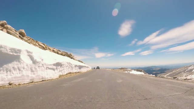 POV point of view -  Driving on alpine road of Mount Evans in Early Summer