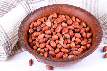 Peanuts in a brown plate