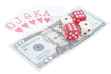 Dices and game cards on dollars.