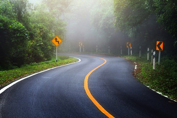 Abstract background of empty route and journey amidst the natural beautiful in the forests at Doi Inthanon, Chiangmai Province in Thailand