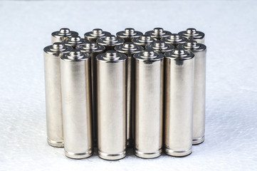 silver AA batteries isolated on white