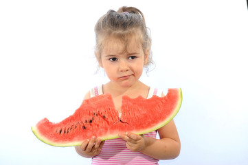 child girl eating watermelon isolated on white background