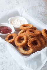 Onion rings with mayonnaise and ketchup