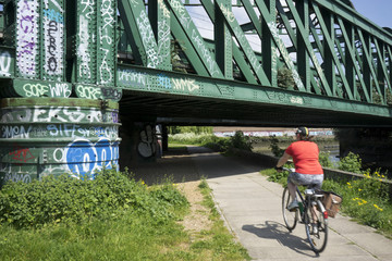 Railway bridge with graffiti at Bromley by Bow in east London. UK