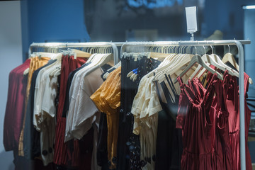 Women clothing on racks in a store in Madrid