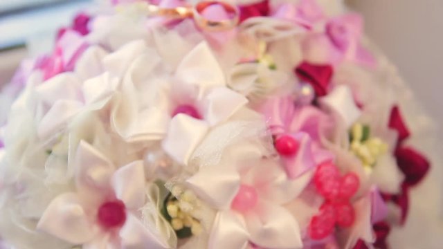 Rings newlyweds and a bride bouquet with accessories