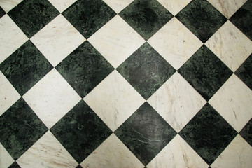 Green and white checkered marble floor pattern