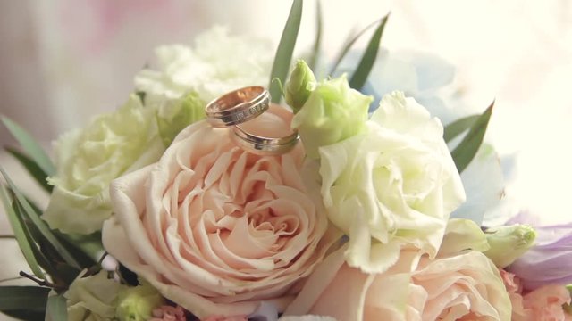 Rings newlyweds and a bride bouquet with accessories