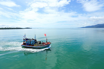 Naklejka na ściany i meble Ferry Carry car vehicles acroos Thai Bay to Koh Chang Island in beautiful sunshine day