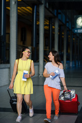 Young women hurry to their train